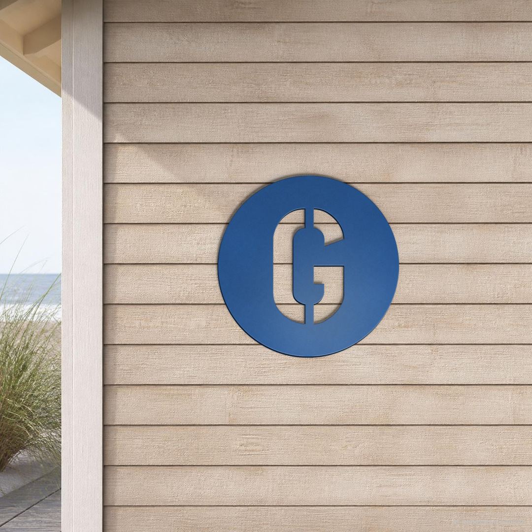 AI-generated sample: Round G in Traffic Blue, Stick No Bills stencil, beach house wall